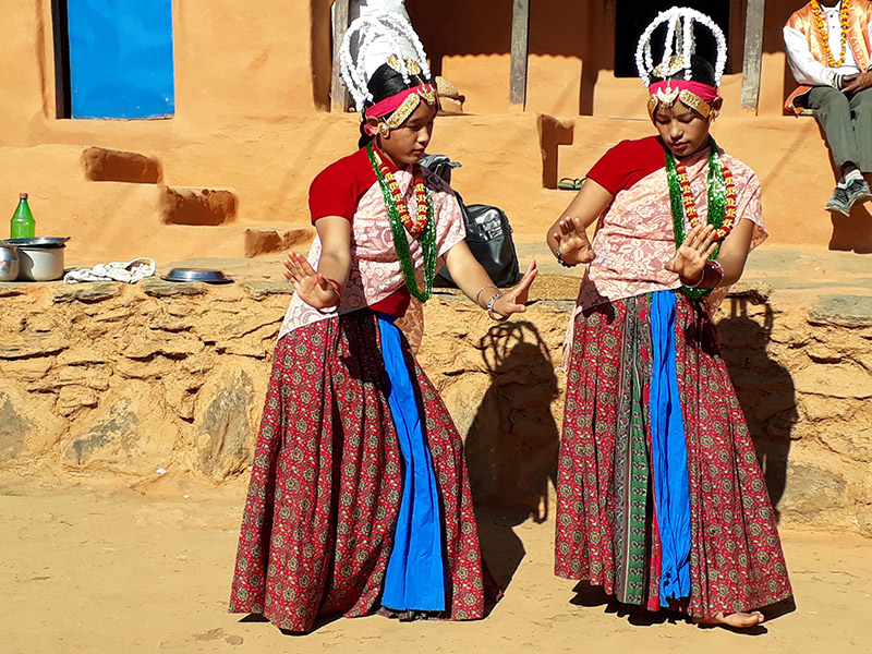 Women from Gurung community performing 'Ghatu' and 'Jhara' dance forms, at Pokharichaap of Putali Bazaar Municipality-4, in Syangja district, on Tuesday, December 18, 2018. Photo: Rishi Ram Baral/THT