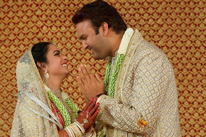 Bride Isha Ambani, the daughter of the Chairman of Reliance Industries Mukesh Ambani, and her groom Anand Piramal, heir to a real-estate and pharmaceutical business, after they got married in Mumbai, India, December 12, 2018. Photo: Reliance Industries/Handout via Reuters