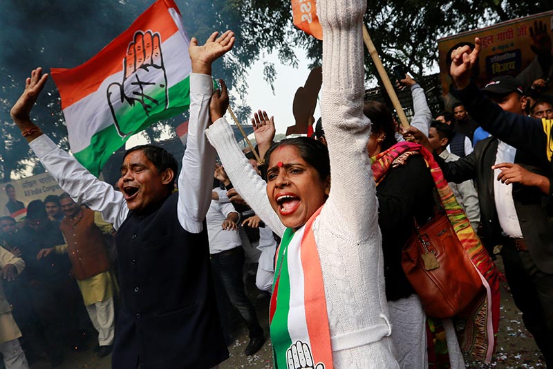 Supporters of India's main opposition Congress party celebrate after the initial poll results at the party headquarters in New Delhi, India, December 11, 2018. Photo: Reuters