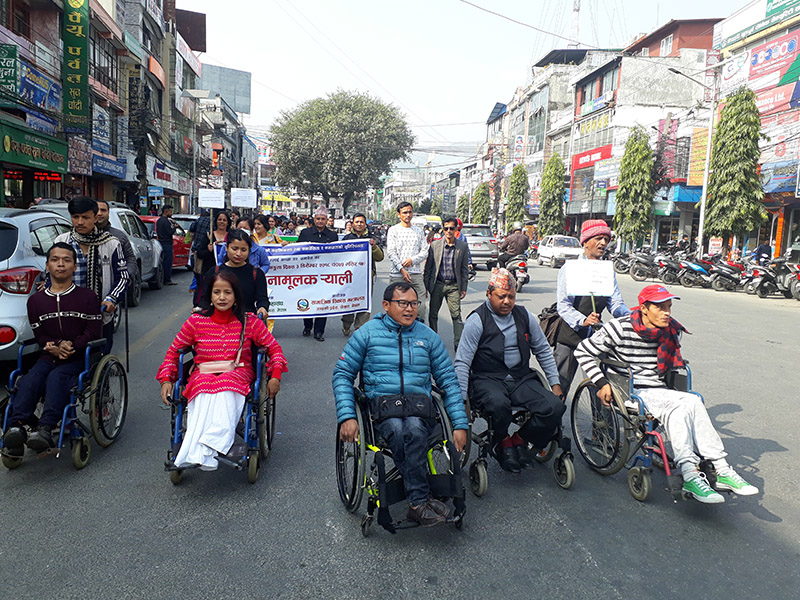 Participants at an informative awareness rally taken out to mark the International Day of Persons with Disabilities, in Pokhara, on Monday, December 3, 2018. Photo: Rishi Ram Baral/THT