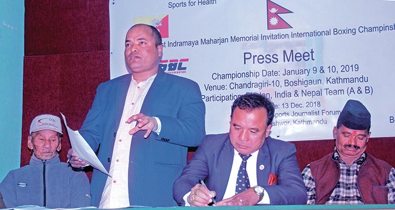 President of Boshigaun Sports Club Deepak Maharjan speaks as NBA President Ram Awale (right) and legendary boxing coach Suresh Ale Magar look on during a press meet. Photo: THT
