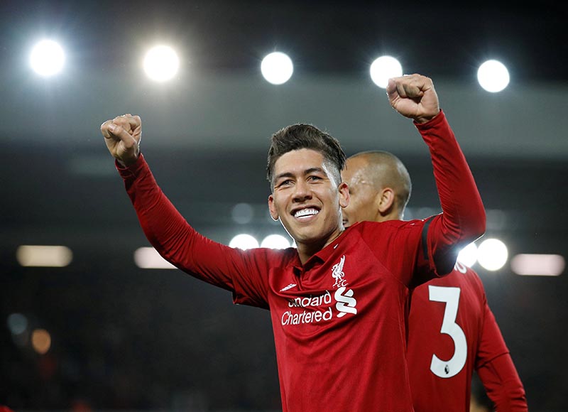 Liverpool's Roberto Firmino celebrates scoring their fifth goal during the Premier League match between Liverpool and Arsenal, at Anfield, in Liverpool, Britain, on December 29, 2018. Photo: Reuters