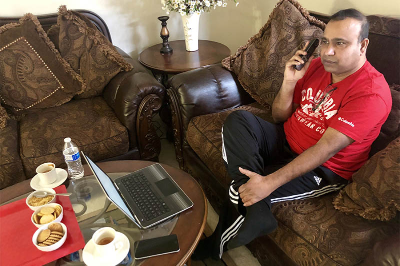 Madhu Bellam, a member of the Overseas Friends of BJP (OFBJP), calls potential voters in Hyderabad, India, from his home in Clarksburg, Maryland, US, December 2, 2018. Photo: Reuters
