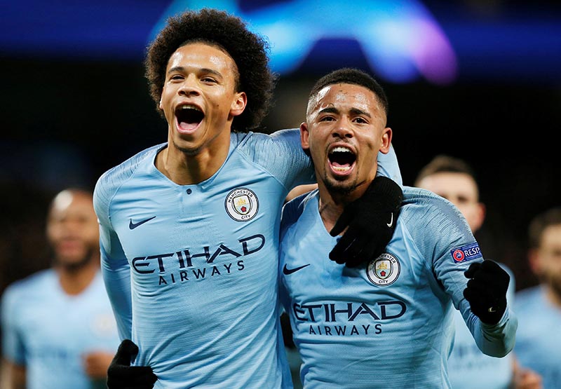 Manchester City's Leroy Sane celebrates with Gabriel Jesus after scoring their first goal during the Champions League Group Stage match of Group F between Manchester City and TSG 1899 Hoffenheim,  Etihad Stadium, in Manchester, Britain, on December 12, 2018. Photo: Reuters