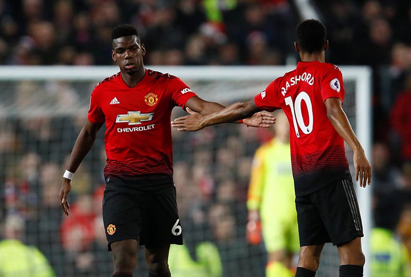 Manchester United's Paul Pogba and Marcus Rashford during the Premier League match between Manchester United and Huddersfield Town, at Old Trafford, in Manchester, Britain, on December 26, 2018. Photo: Action Images via Reuters