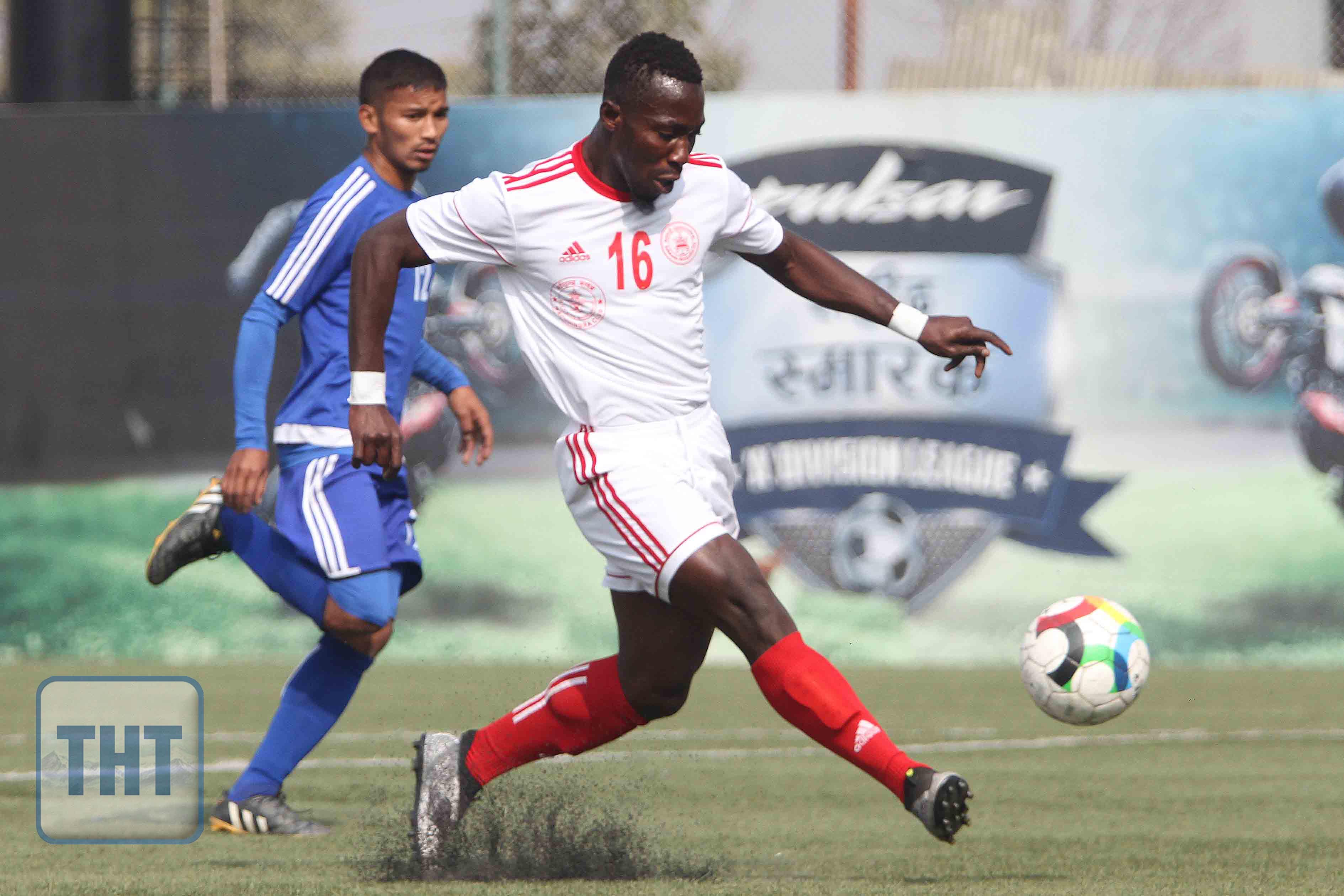 Vassadia Diamande (right) of Mchhindra Club dribbles the ball against Krishna Rana Bhat of Saraswoti Youth Club during their Pulsar Marytru2019s Memorial u2018Au2019 Division League match at ANFA ground in Laltipur on Friday. Photo: Udipt Singh Chhetry