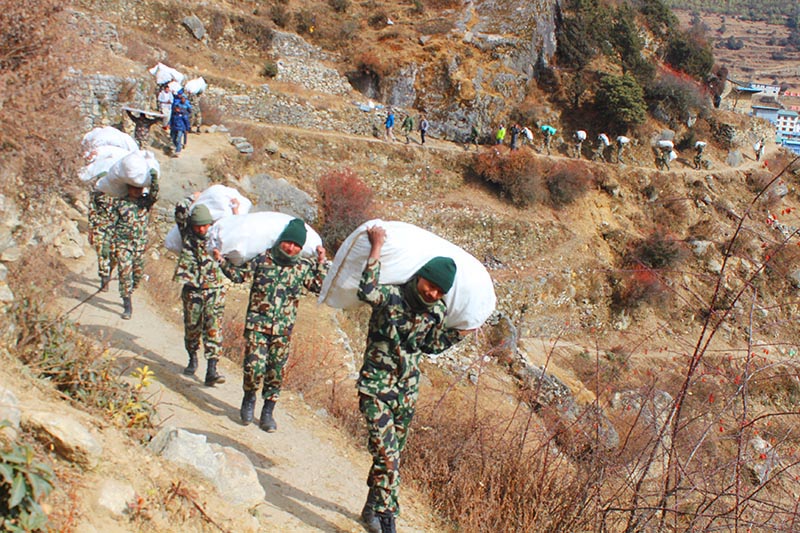 Nepal Army personnel from Shumsher Gulma carry sacks of garbage while taking part in 'Mt Ama Dablam Clean-up Mega Campaign', in Khumbu Pasang Lhamu Rural Municipality of Solukhumbu district, in December 2018. Photo courtesy: Sarbes Baral