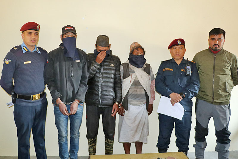 Three suspects being paraded at Kaski District Police Office, in Pokhara, on Monday, December 31, 2018. Photo: Rishi Ram Baral/THT