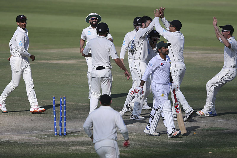 New Zealand's players celebrate dismissal of Pakistan's Sarfraz Ahmed in their test match in Abu Dhabi, United Arab Emirates, on Friday, December 07, 2018. Photo: AP