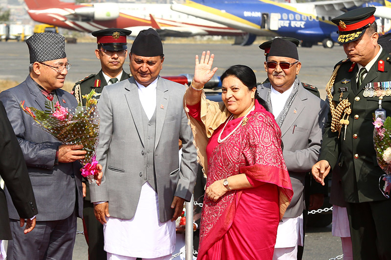 President Bidya Devi Bhandari is greeted by Prime Minister KP Sharma Oli, Deputy Prime Minister and Minister for Defence Ishwor Pokhrel, and Home Minister Ram Bahadur Thapa on her arrival from Poland, at Tribhuvan International Airport, in Kathmandu, on Thursday, December 6, 2018. Photo: RSS