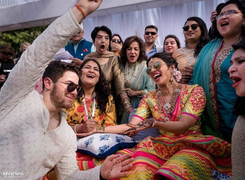 Jodhpur : HANDOUT: Friday, Nov. 30, 2018 Bollywood actress Priyanka Chopra and Nick Jonas celebrate during their mehendi ceremony, a day before their wedding, at Umaid Bhawan in Jodhpur, Rajasthan,on  Friday, Nov,30, 2018. Photo: AP