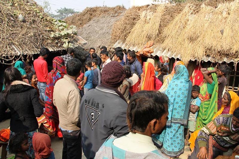 Villagers gathering after a local woman died of heart attack in Rajgadh Rural Municipality, Saptari, on Tuesday, December 25, 2018. Photo: THT