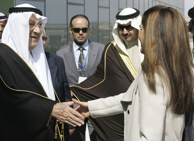 Saudi Prince Talal bin Abdelaziz (left), receives Queen Rania of Jordan during the opening ceremony of the Arab Open University, Jordan branch, in Amman, Jordan, on February 24, 2010. Photo: AP/ File
