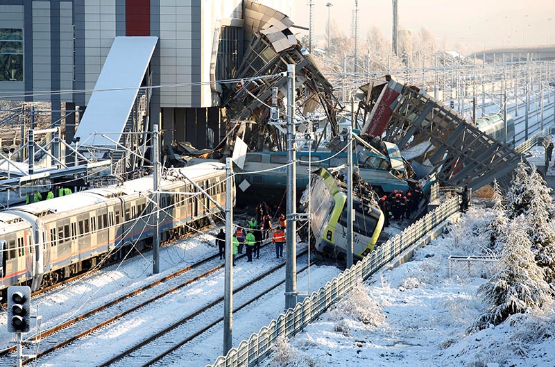 Rescue workers search at the wreckage after a high speed train crashu00a0in Ankara, Turkey December 13, 2018. Photo: Reuters
