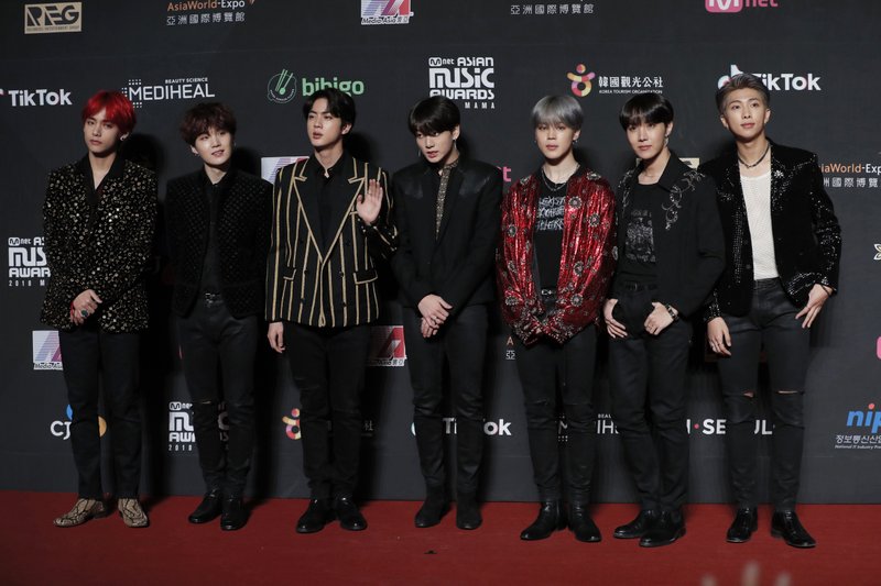 BTS FILE- In this Dec. 14, 2018, file photo members of South Korean music band BTS pose for photos on the red carpet of the Mnet Asian Music Awards (MAMA) in Hong Kong. Photo: AP