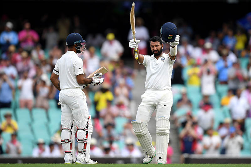 India's Cheteshwar Pujara celebrates scoring his century on day one of the fourth test match between Australia and India at the SCG in Sydney, Australia, January 3, 2019. Photo: Reuters