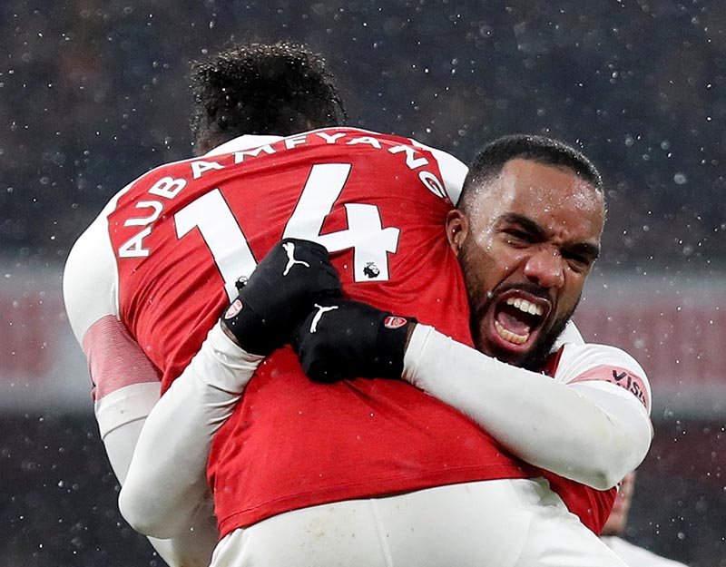 Arsenal's Pierre-Emerick Aubameyang celebrates scoring their first goal with Alexandre Lacazette during the Premier League match bewteen Arsenal and Cardiff City, at Emirates Stadium, in London, Britain, on January 29, 2019. Photo: Action Images via Reuters