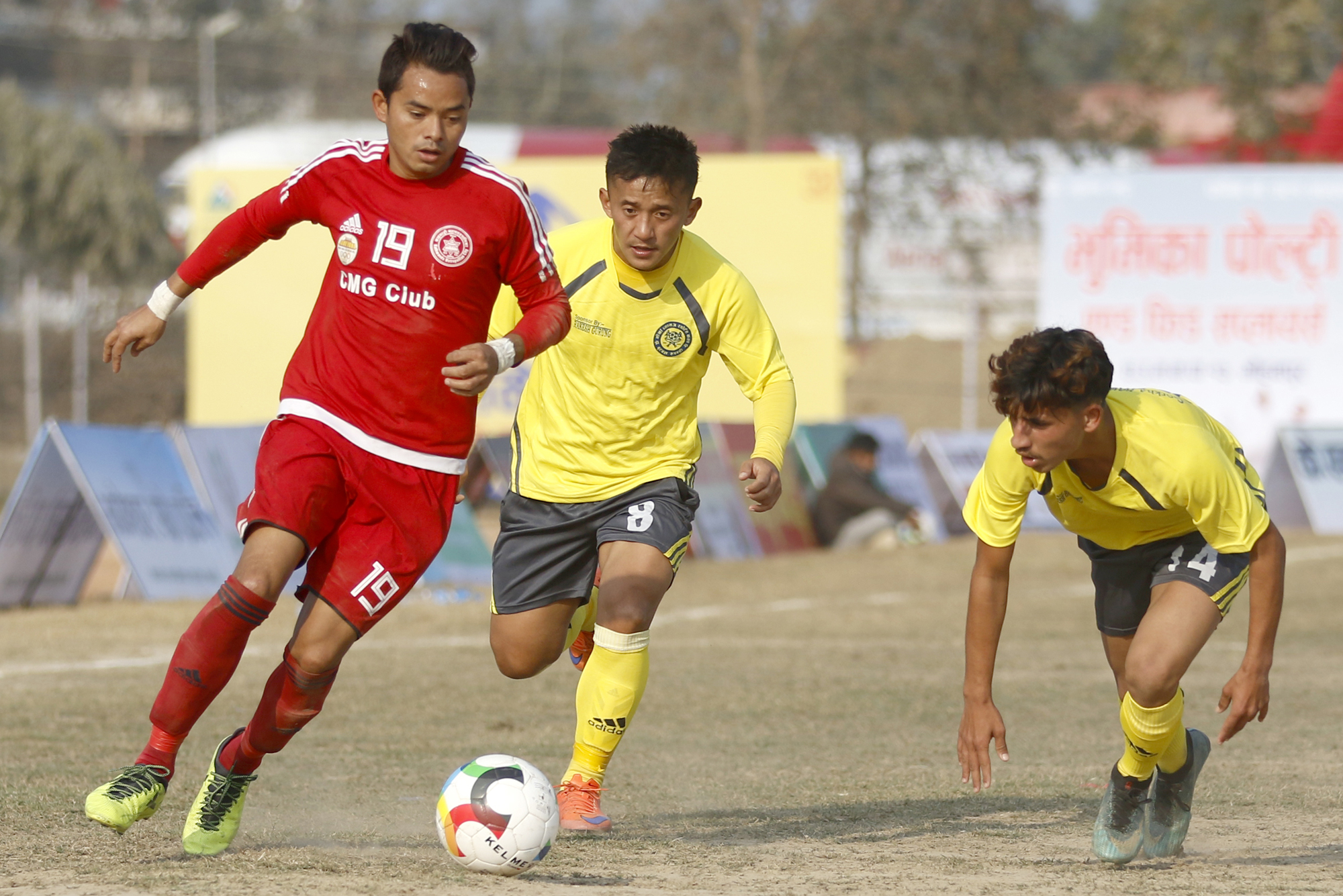 Laxman Ruchal (left) of CMG Club Sankata vies for the ball with Uttam Gurung of Gorkha Boys during their Nepal Ice Farwest Khaptad Gold Cup match in Dhangadhi on Friday, January 11, 2019. Photo: THT