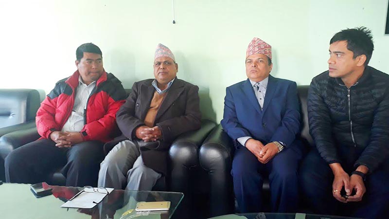 Speaker Krishna Bahadur Mahara (second from left) taking to mediapersons in Pokhara airport, on Wednesday, January 9, 2019. Photo: THT