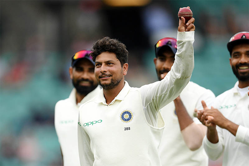 India's Kuldeep Yadav holds the ball up after taking five wickets for the innings, on day four of the fourth test match between Australia and India at the SCG in Sydney, Australia, January 6, 2019. Photo: Reuters