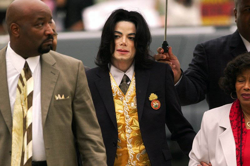 FILE: Michael Jackson arrives at the Santa Barbara County Courthouse for his child molestation trial in Santa Maria, Calif. Photo: AP