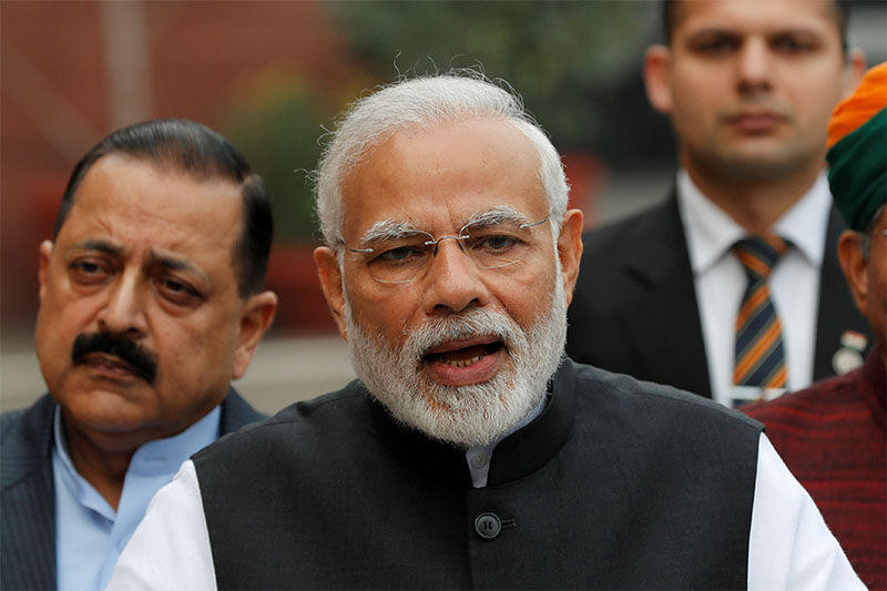 FILE PHOTO: India's Prime Minister Narendra Modi speaks with the media inside the parliament premises on the first day of the winter session, in New Delhi, India, December 11, 2018. Photo: Reuters