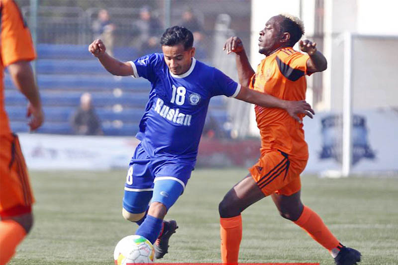 Players vie for a ball during their Pulsar Martyr's Memorial 'A' Division League in Kathmandu, on Sunday, January 04, 2018. Photo: ANFA/facebook