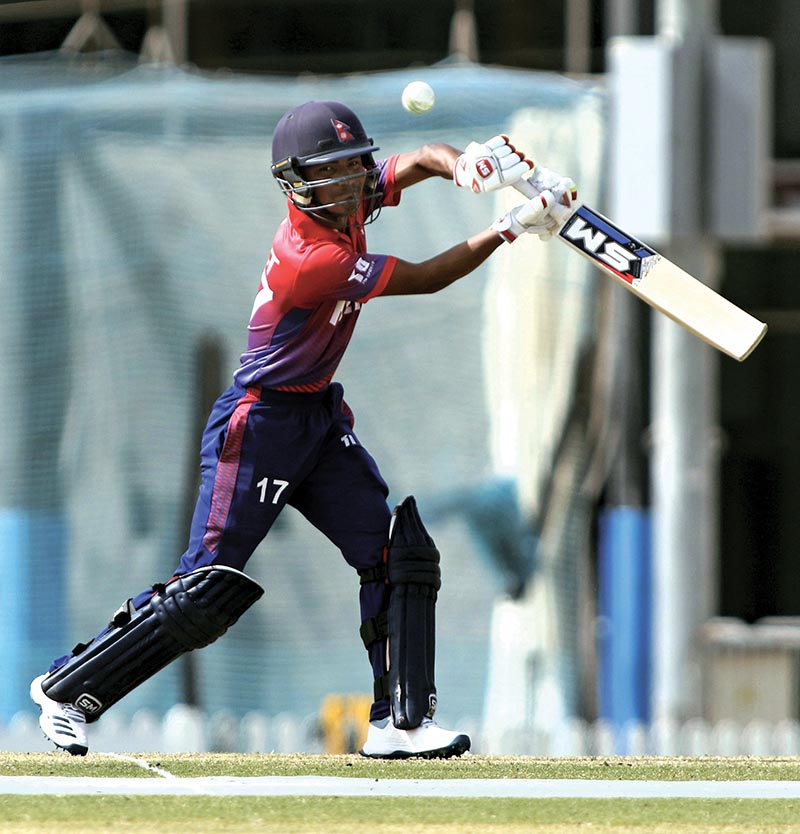 Rohit Paudel playing a shot against United Arab Emirates in the second game of the three-match ODI series in Dubai on Saturday. Photo Courtesy: CricketingNepal