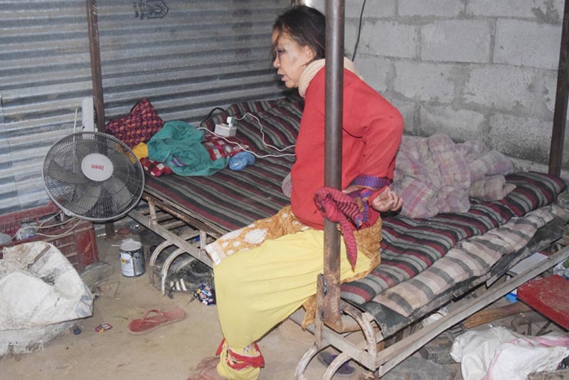 Sunita Bote, 33, a mental patient, who has been kept in chains at her house due to lack of money for treatment at Aansidobhan of Nilkantha Municipality,  Dhading, on Monday, December 31, 2018. Photo: THT