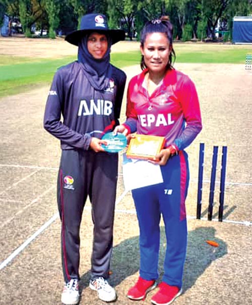Nepal skipper Rubina Chhetri Belbashi (right) with her UAE counterpart Humaria Tasneem before their Women’s T20 Smash match in Bangkok on Monday. Photo Courtesy: Cricket Association of Thailand