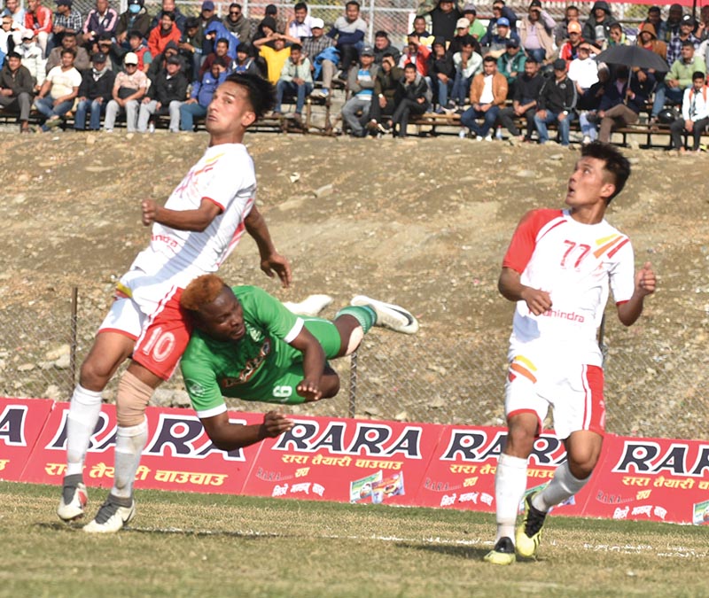 Players of Nepal APF Club and Sahara Club (centre) in action during the 17th Aaha Rara Gold Cup at the Pokhara Stadium on Thursday. Photo Courtesy: Sudarshan Ranjitu00a0