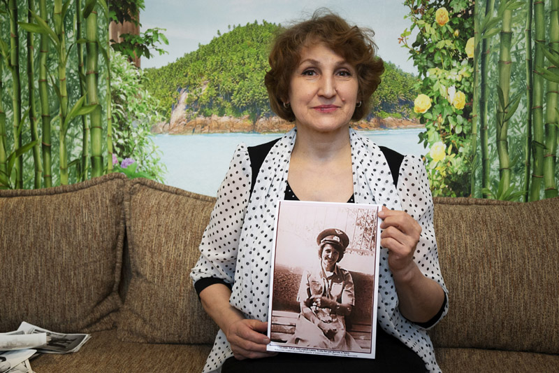 In this photo taken on Sunday, February 10, 2019, Tatyana Rybalchenko, who worked as a nurse during the Soviet campaign in Afghanistan between 1986 and 1988, holds a photo of her taken in June 1986 in Kabul, Afghanistan, during her interview with The Associated Press in Moscow, Russia. As Russia this week marks the 30th anniversary of the withdrawal of the Soviet troops, the memories of the war are still fresh for female nurses and clerks and shopkeepers, mostly young and single, who were thrust into the disastrous campaign that came to known as Russia's Vietnam. Photo: AP