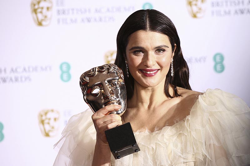 Actress Rachel Weisz poses for photographers backstage with her Best Supporting Actress award for her role in the film 'The Favourite' at the BAFTA awards in London, Sunday, February 10, 2019. Photo: AP