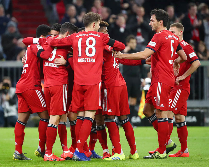 Bayern Munich's Robert Lewandowski celebrates with team mates. Photo: Reuters