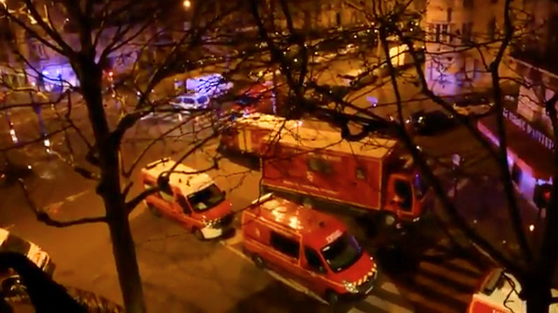 Emergency vehicles line a street where a residential building had caught fire in Paris, France, February 5, 2019, in this still image taken from a social media video. Photo: Pierre-Alexandre Vezinet/via Reuters
