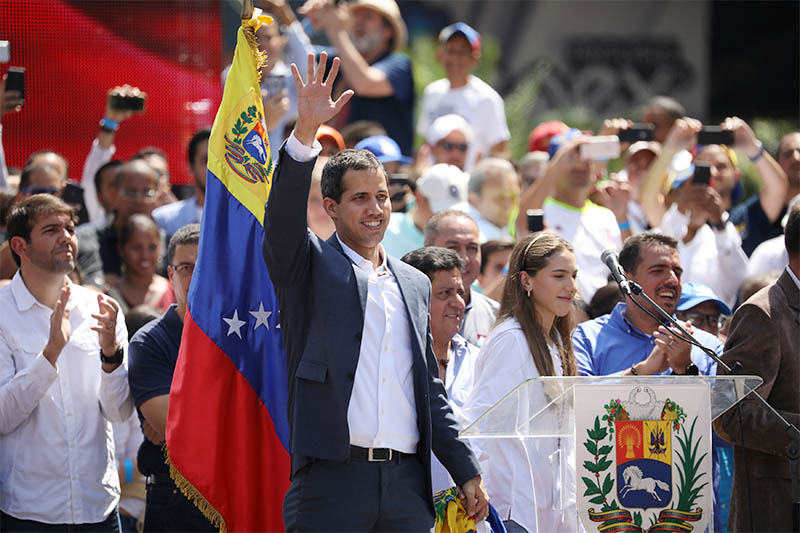 Venezuelan opposition leader and self-proclaimed interim president Juan Guaido waves to supporters during a rally against Venezuelan President Nicolas Maduro's government in Caracas, Venezuela February 2, 2019. Photo: Reuters