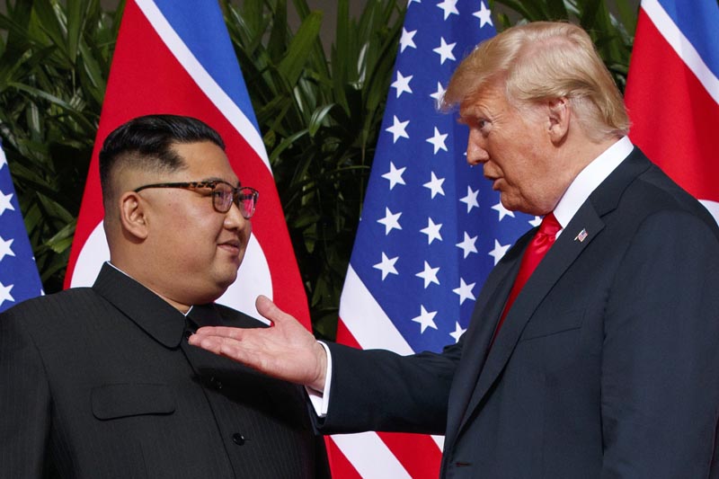 FILE: In this June 12, 2018, file photo, US President Donald Trump, right, meets with North Korean leader Kim Jong Un on Sentosa Island in Singapore. Photo: AP