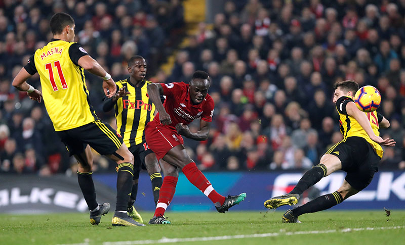 Liverpool's Sadio Mane shoots at goal during the Premier League match between Liverpool and Watford, at Anfield, in Liverpool, Britain, on February 27, 2019. Photo: Reuters