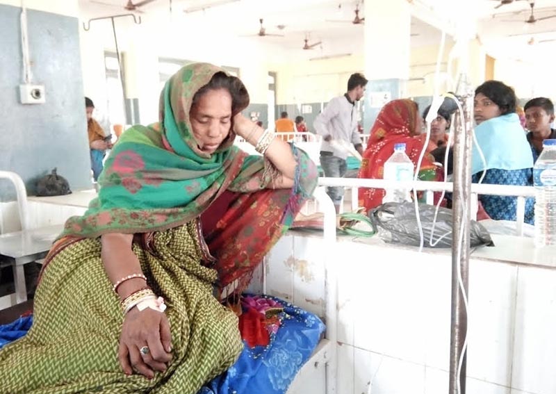 A woman, who was thrashed by a police constable, receiving treatment in Gajendra Narayan Singh Sagarmatha Zonal Hospital, in Rajbiraj, Saptari, on Sunday. Photo: THT