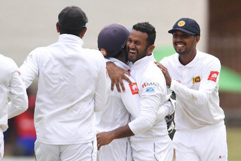 Sri Lankan players celebrate after taking a wicket against South Africa. Courtesy: ICC