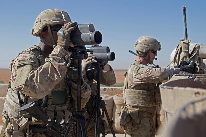 File - US Soldiers surveil the area during a combined joint patrol in Manbij, Syria, on November 1, 2018. Photo: US Army via Reuters