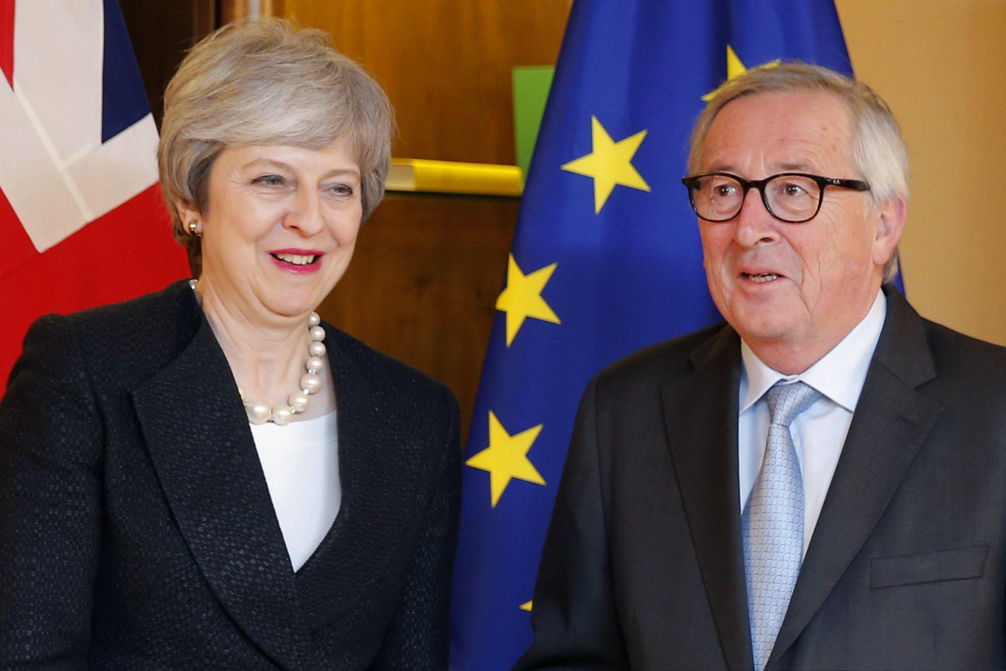 British Prime Minister Theresa May, left, poses for the media with European Commission President Jean-Claude Juncker in Strasbourg, France, Monday, March 11, 2019. Photo: AP
