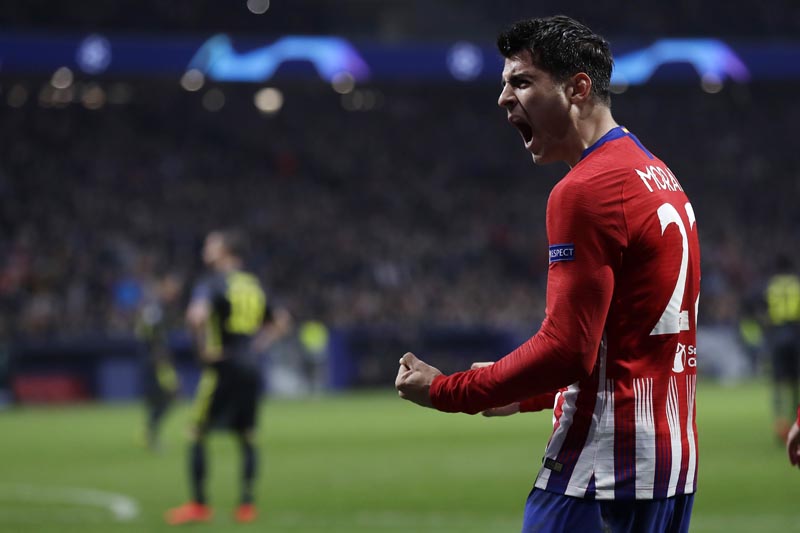 Atletico forward Alvaro Morata reacts after scoring his side's opening goal but the goal was disallowed after a review by VAR during the Champions League round of 16 first leg soccer match between Atletico Madrid and Juventus at Wanda Metropolitano stadium in Madrid, Wednesday, February 20, 2019. Photo: AP