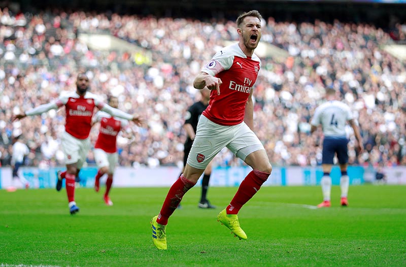 Arsenal's Aaron Ramsey celebrates scoring their first goal during the Premier League match between Tottenham Hotspur and Arsenal, at Wembley Stadium, in London, Britain, on March 2, 2019. Photo: Action Images via Reuters
