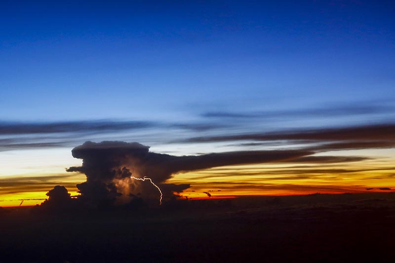 A lighting strike is pictured from an aircraft at an area in Singapore. Photo: Skanda Gautam/THT