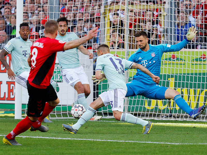 SC Freiburg's Mike Frantz shoots at goal. Photo: Reuters