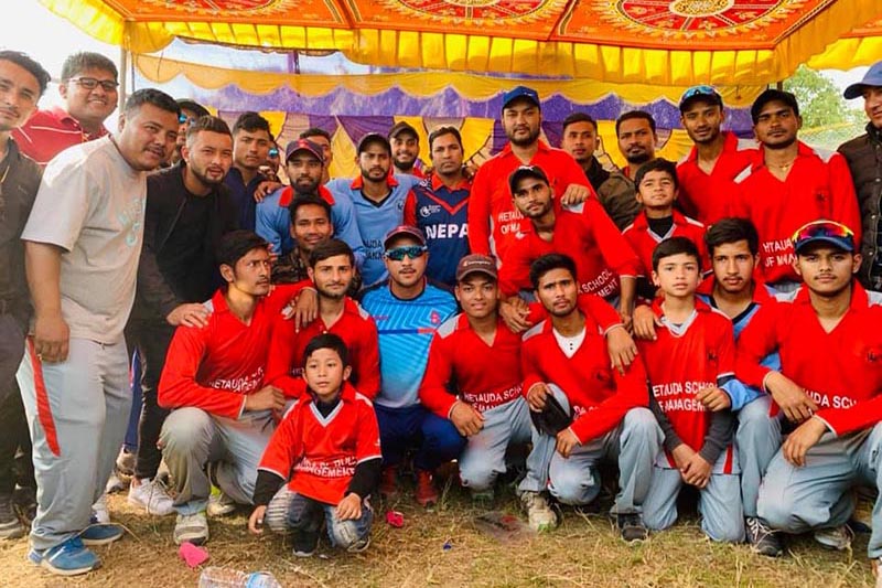 Players and officials of Paras-XI and Niraj-XI after a charity cricket match organised to raise funds for the ntreatment of former player and coach Niraj Shrestha at the Huprachaur grounds in Makawanpur on Saturday, March 9, 2019. Photo: THT