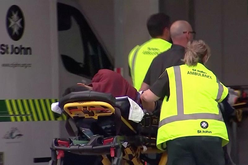 Emergency services personnel push stretchers carrying a person into a hospital, after reports that several shots had been fired, in central Christchurch, New Zealand March 15, 2019, in this still image taken from video. Photo: TVNZ/via REUTERS TV