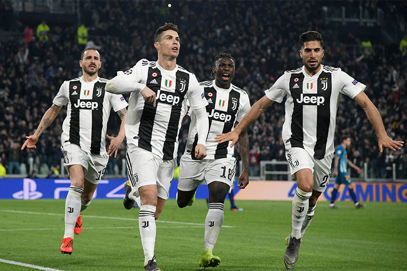 Juventus' Cristiano Ronaldo celebrates scoring their third goal to complete his hat-trick with team mates. Photo: Reuters