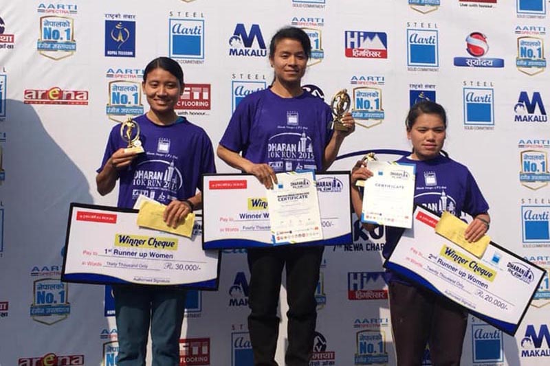 Kanchhi Maya Koju (centre), Santoshi Shrestha (left) and Pushpa Bhandari after Dharan 10K Run on Saturday, March 10, 2019. Photo: THT